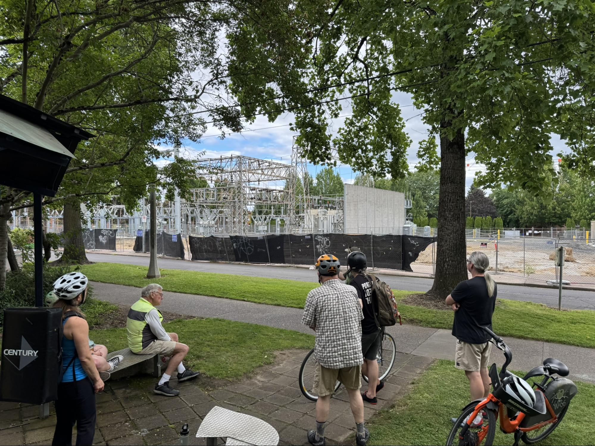 Community members gathered across from the Knott Substation owned by Pacific Power. We gathered to hear Joe D’Ambrosia explain what a substation is and does for our grid.