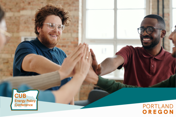 Group of people high five, CUB conference logo below