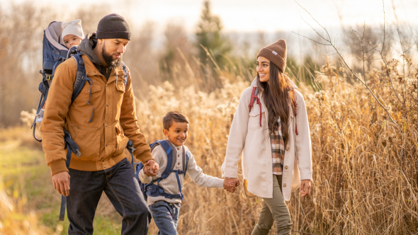 Fall family hike with kids in field