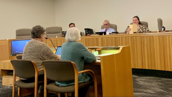 People testifying in front of legislators