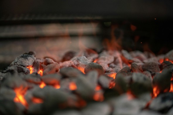 Red grill coals, dark background