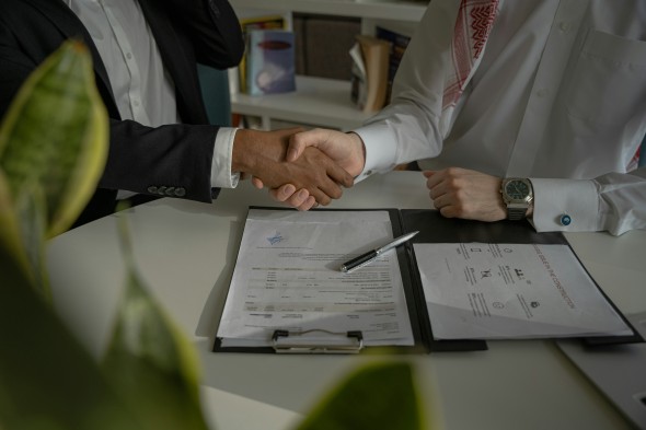 Handshake over a signed set of papers