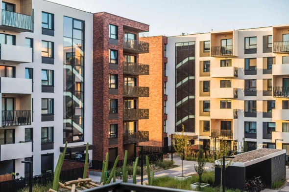 Red, white, and yellow apartment complex